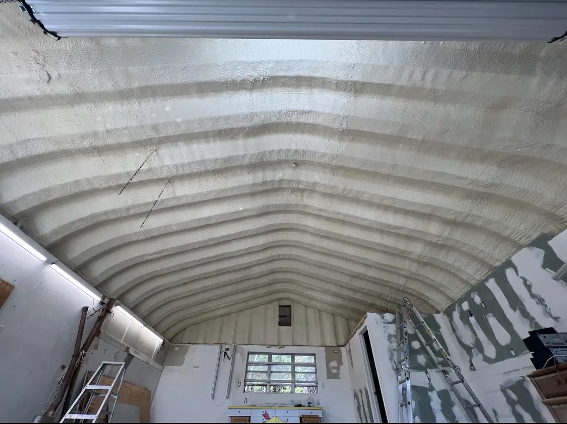 Spray polyurethane foam applied to the underside of a metal roof deck in Leonardtown